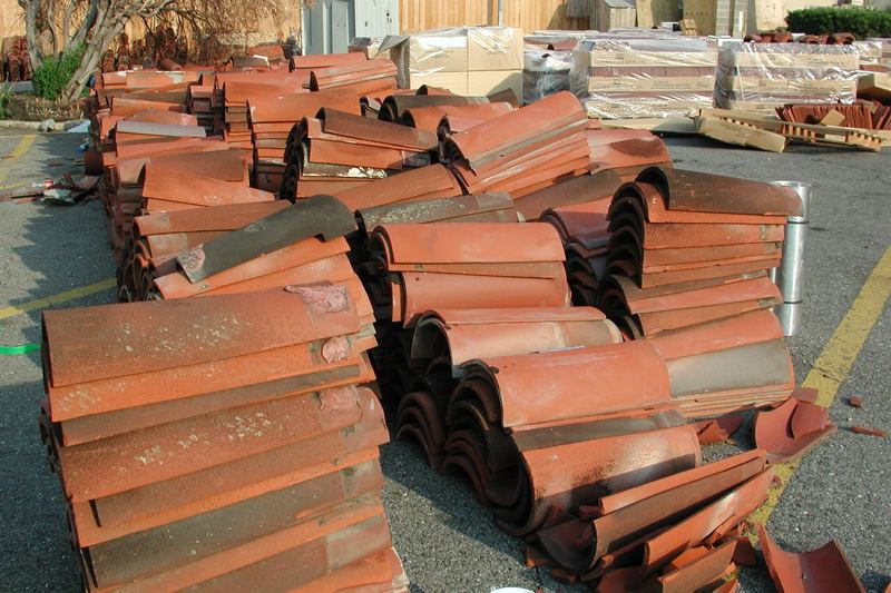Stack of clay roof tiles ready for a roof